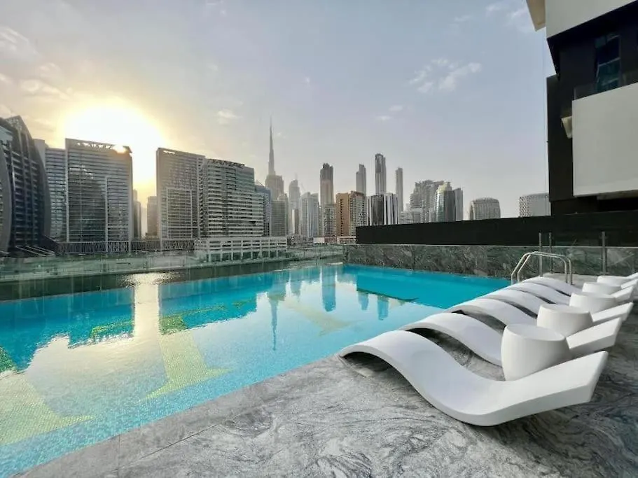 Fam Living Modern Smart Home At Business Bay With Iconic Burj And Canal Views Dubai
